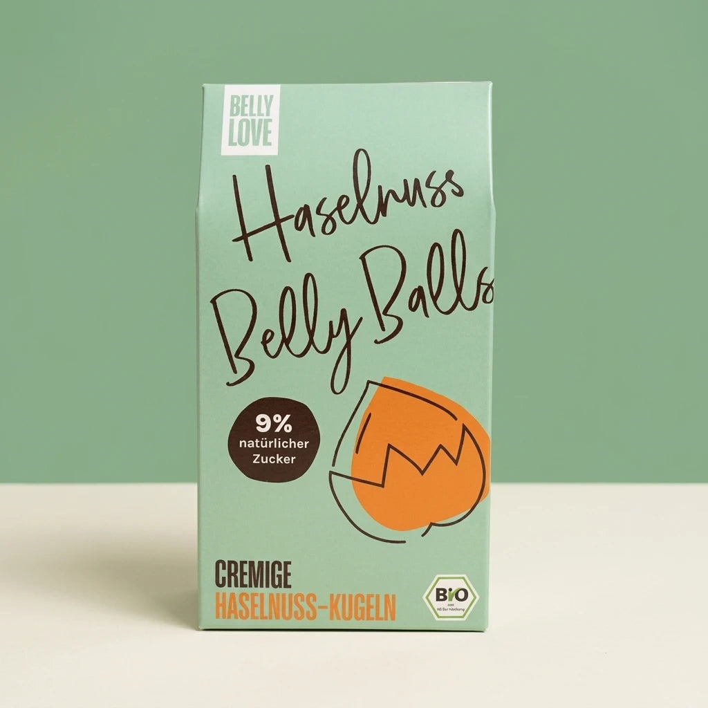 Belly Love Haselnuss Belly Balls – mint-grüne Verpackung, bio-zertifiziert, 9% natürlicher Zucker, cremige Haselnuss-Kugeln
