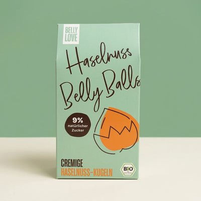 Belly Love Haselnuss Belly Balls – mint-grüne Verpackung, bio-zertifiziert, 9% natürlicher Zucker, cremige Haselnuss-Kugeln